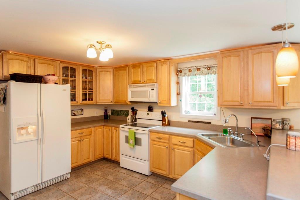 478 Cape Road Raymond, ME 04071 - Photo 6 of 34 Modern kitchen with open concept design