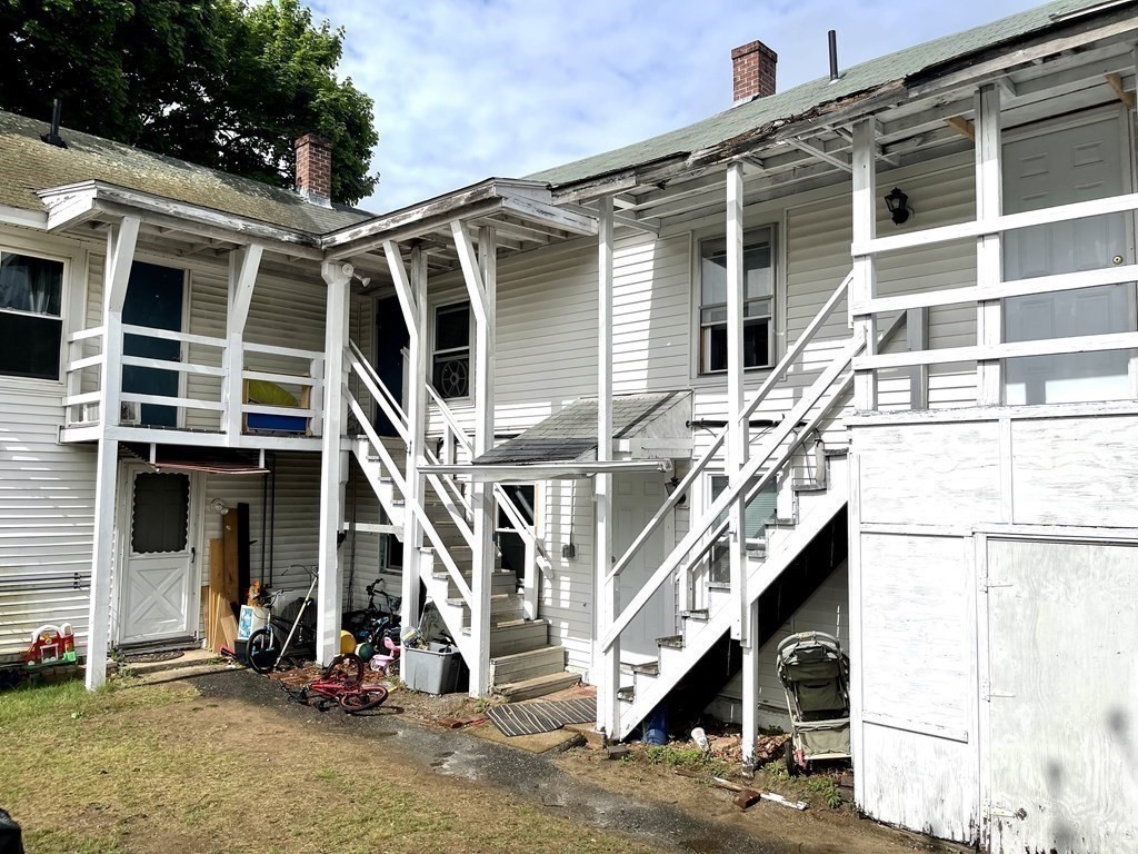 51 Pleasant Street Ware, MA 01082 - Photo 5 of 17 a view of a house with a park