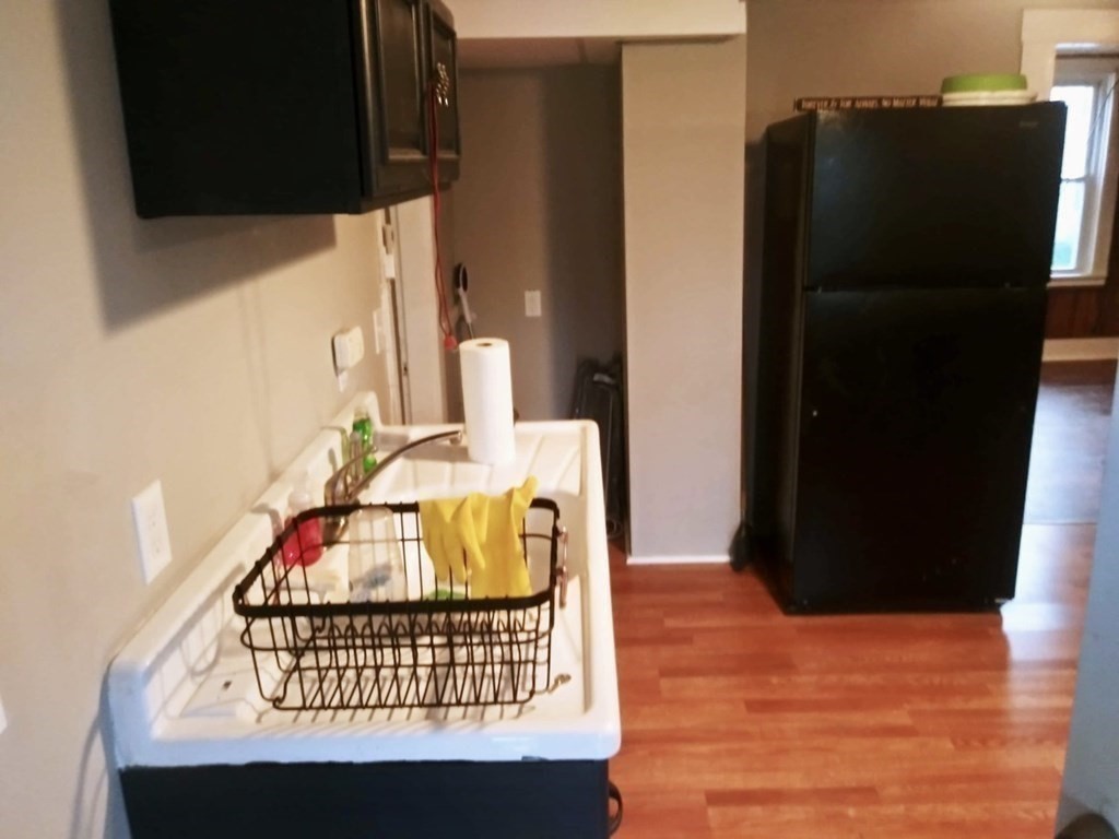 51 Pleasant Street Ware, MA 01082 - Photo 8 of 17 a bathroom with a sink and a mirror