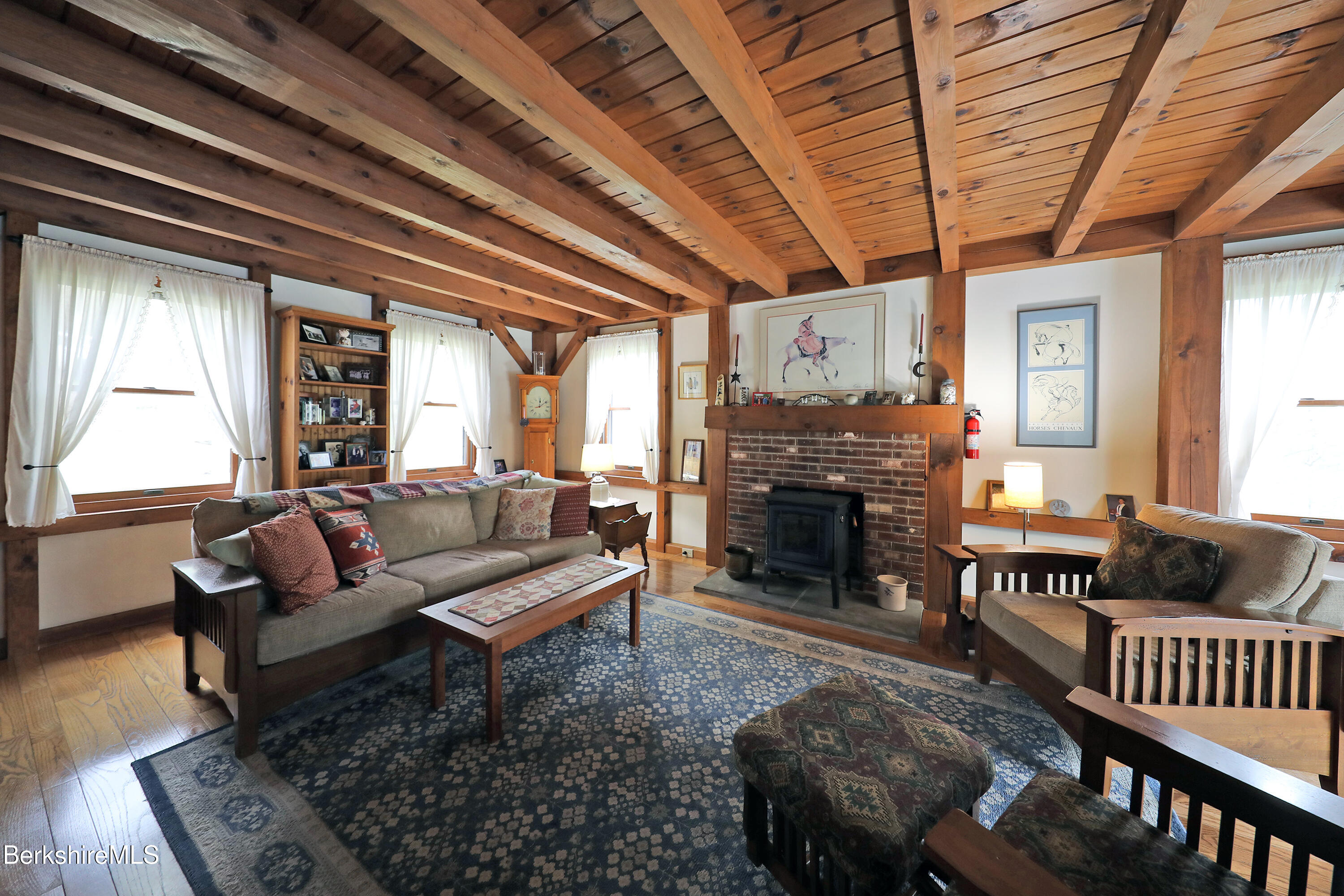 7 Stonebridge Way Tyringham, MA 01238 - Photo 9 of 46 LIVING ROOM HEARTHSTONE WOODSTOVE