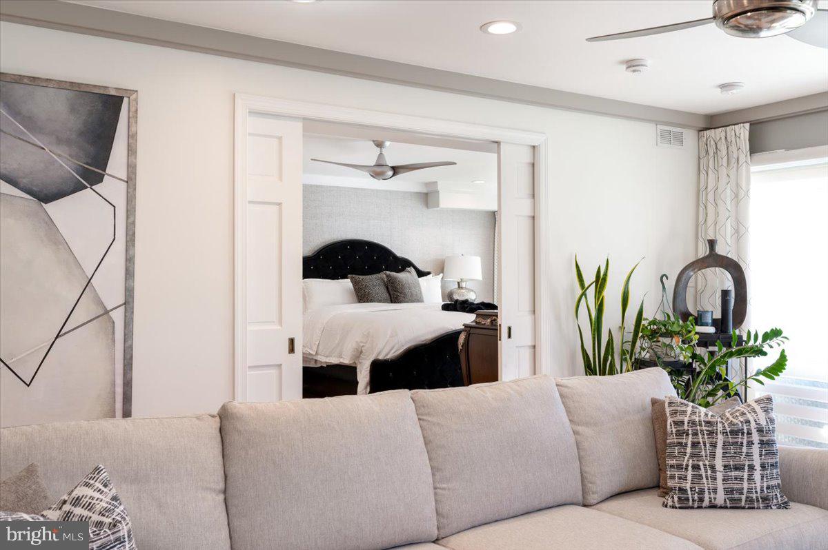 2125 Quay Village Court, Unit T1 Annapolis, MD 21403 - Photo 15 of 36 a living room with furniture flowerpot and a potted plant