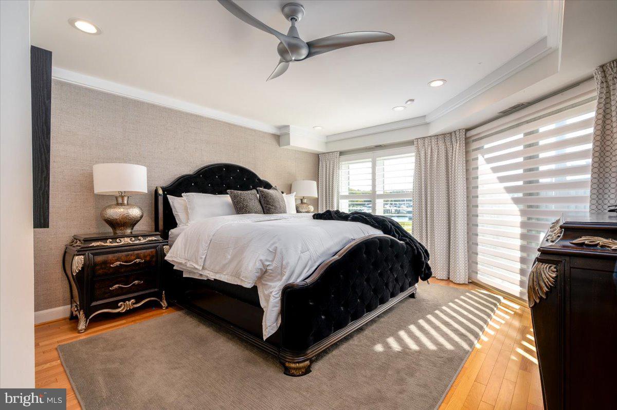 2125 Quay Village Court, Unit T1 Annapolis, MD 21403 - Photo 16 of 36 a bedroom with bed chair and window