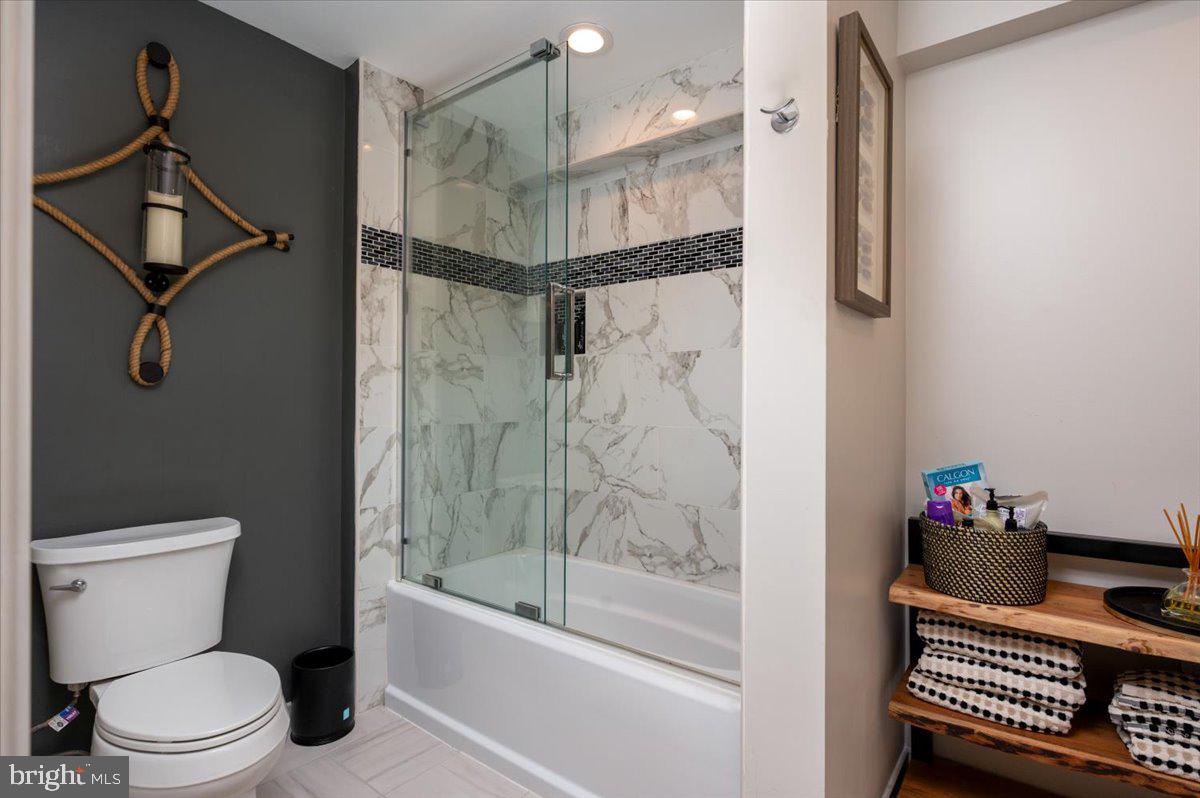 2125 Quay Village Court, Unit T1 Annapolis, MD 21403 - Photo 23 of 36 a bathroom with a toilet and a shower