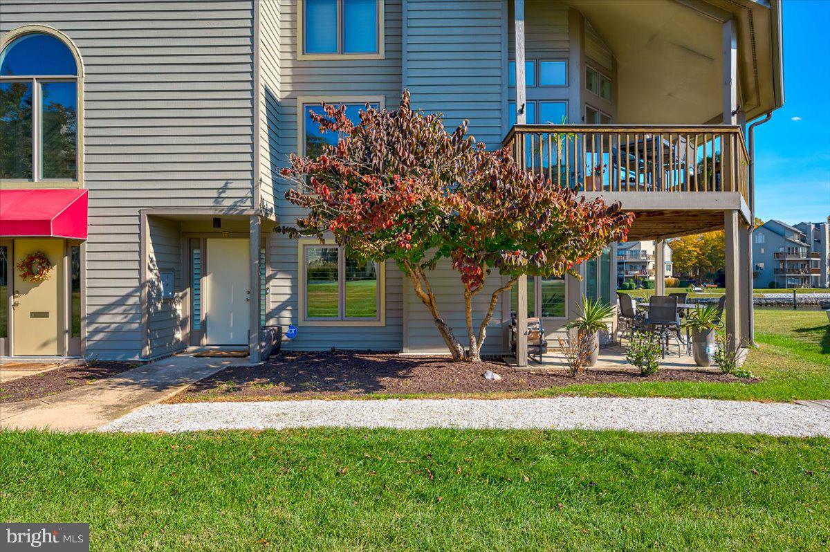 2125 Quay Village Court, Unit T1 Annapolis, MD 21403 - Photo 3 of 36 a front view of a house with a yard