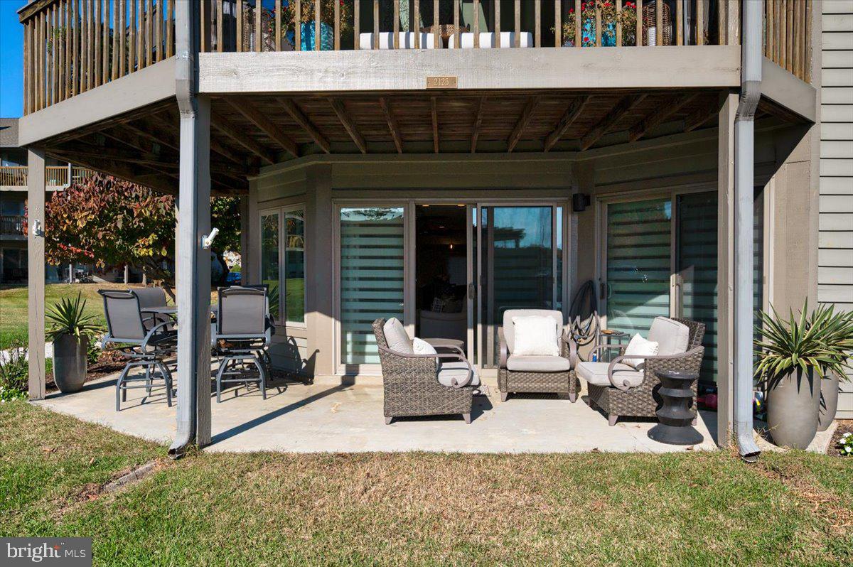2125 Quay Village Court, Unit T1 Annapolis, MD 21403 - Photo 31 of 36 a building outdoor space with patio furniture and potted plants