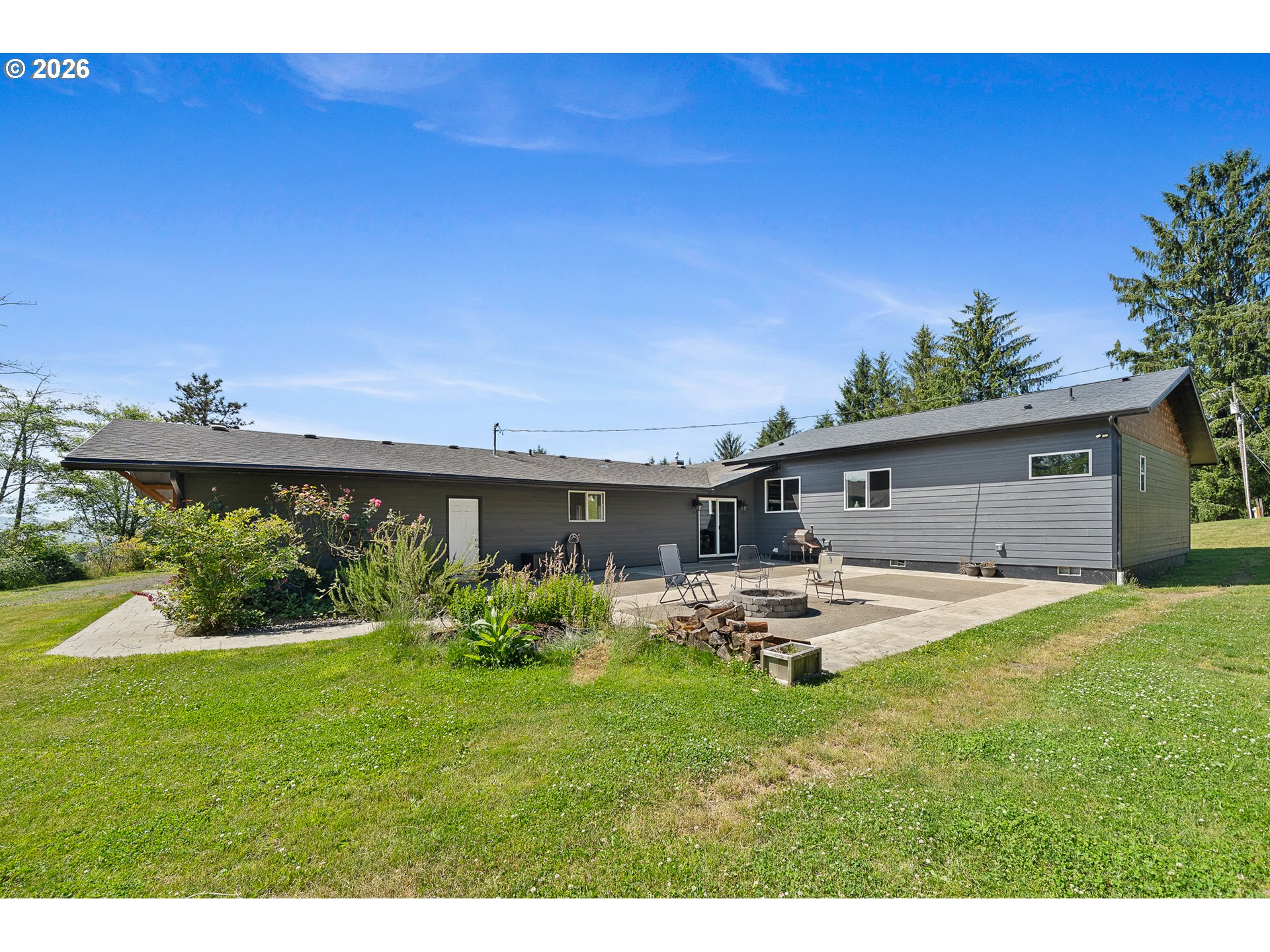 850 Hodgdon Road Tillamook, OR 97141 - Photo 39 of 43 a view of a house with backyard and sitting area