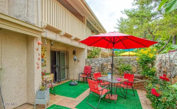 a view of yard with patio