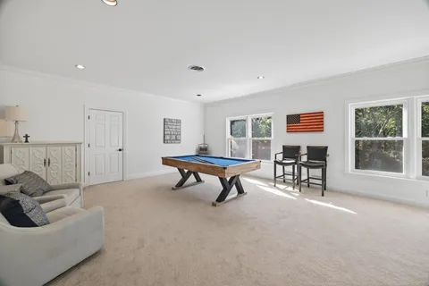 a living room with furniture and a couch
