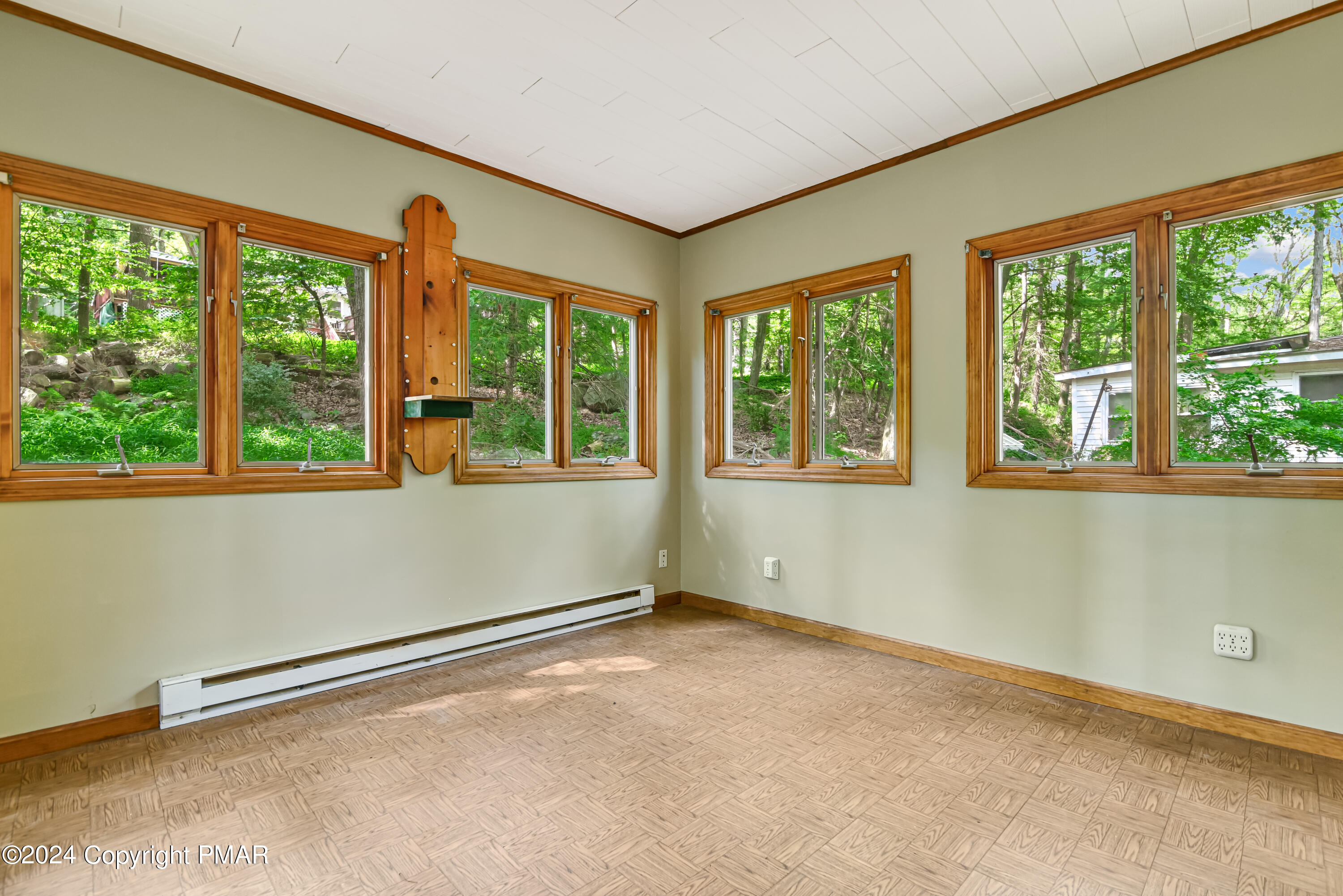 205 Aspen Road Dingmans Ferry, PA 18328 - Photo 15 of 29 a view of an empty room with a window