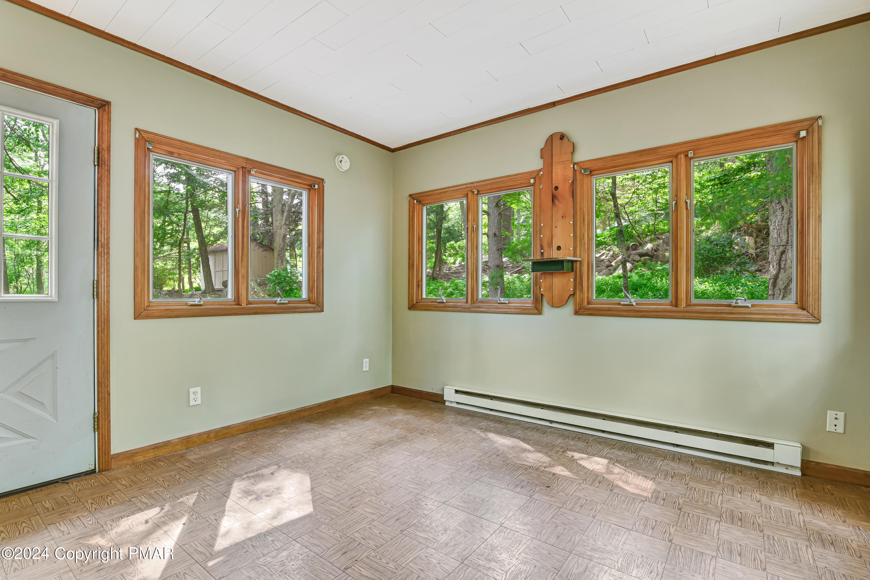 205 Aspen Road Dingmans Ferry, PA 18328 - Photo 16 of 29 a view of an empty room with a window