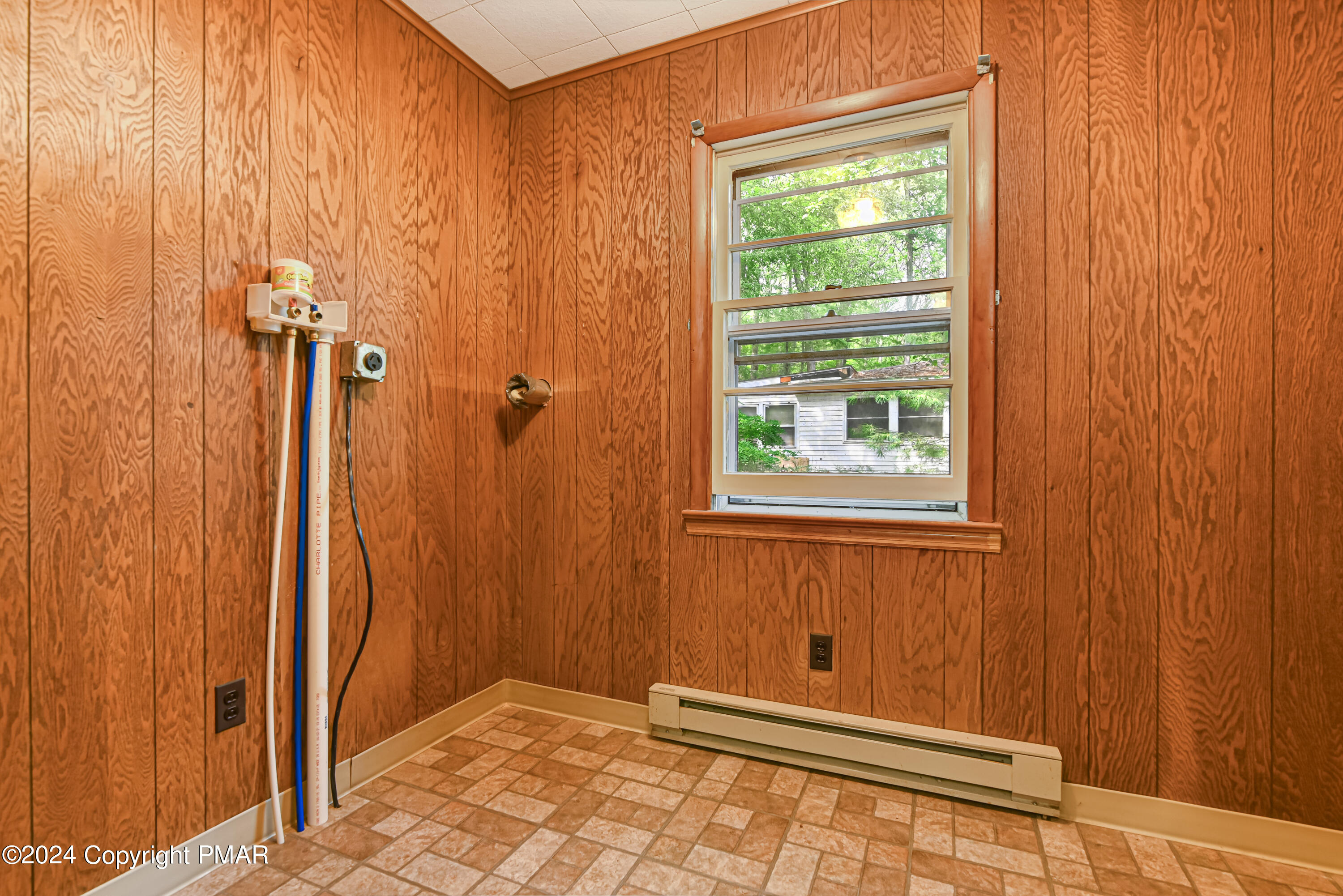 205 Aspen Road Dingmans Ferry, PA 18328 - Photo 18 of 29 a view of a bathroom with a window