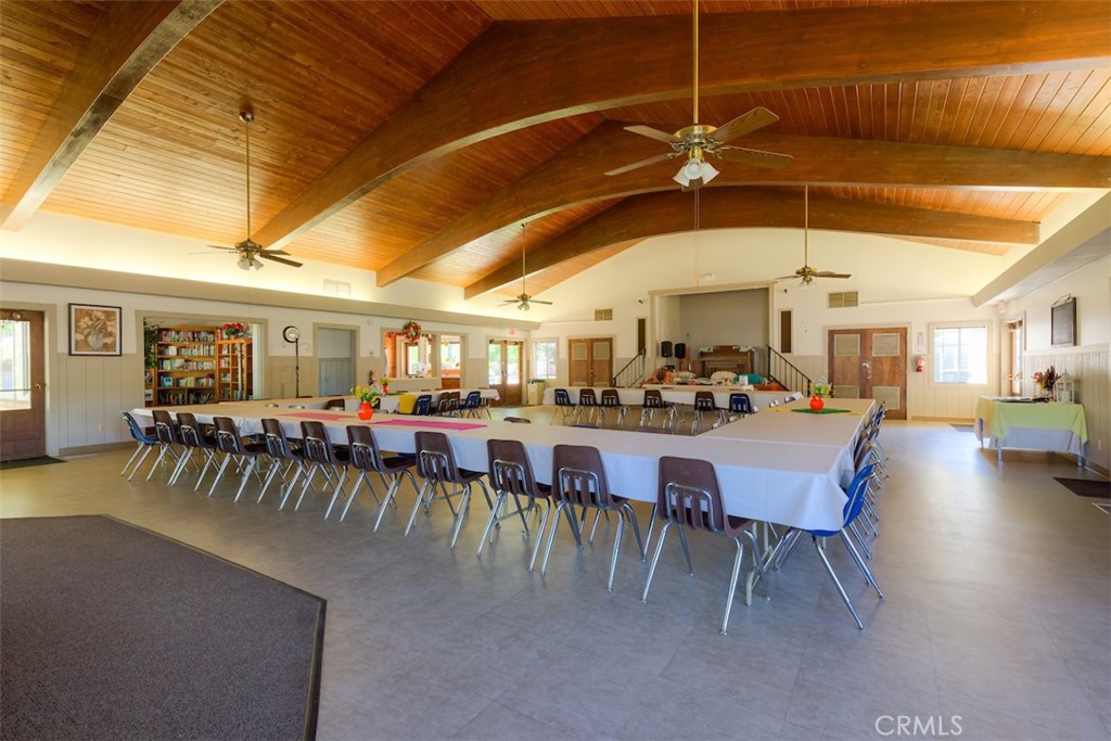 1901 Dayton Road, Unit 133 Chico, CA 95928 - Photo 33 of 36 a dining hall with furniture and a black umbrella