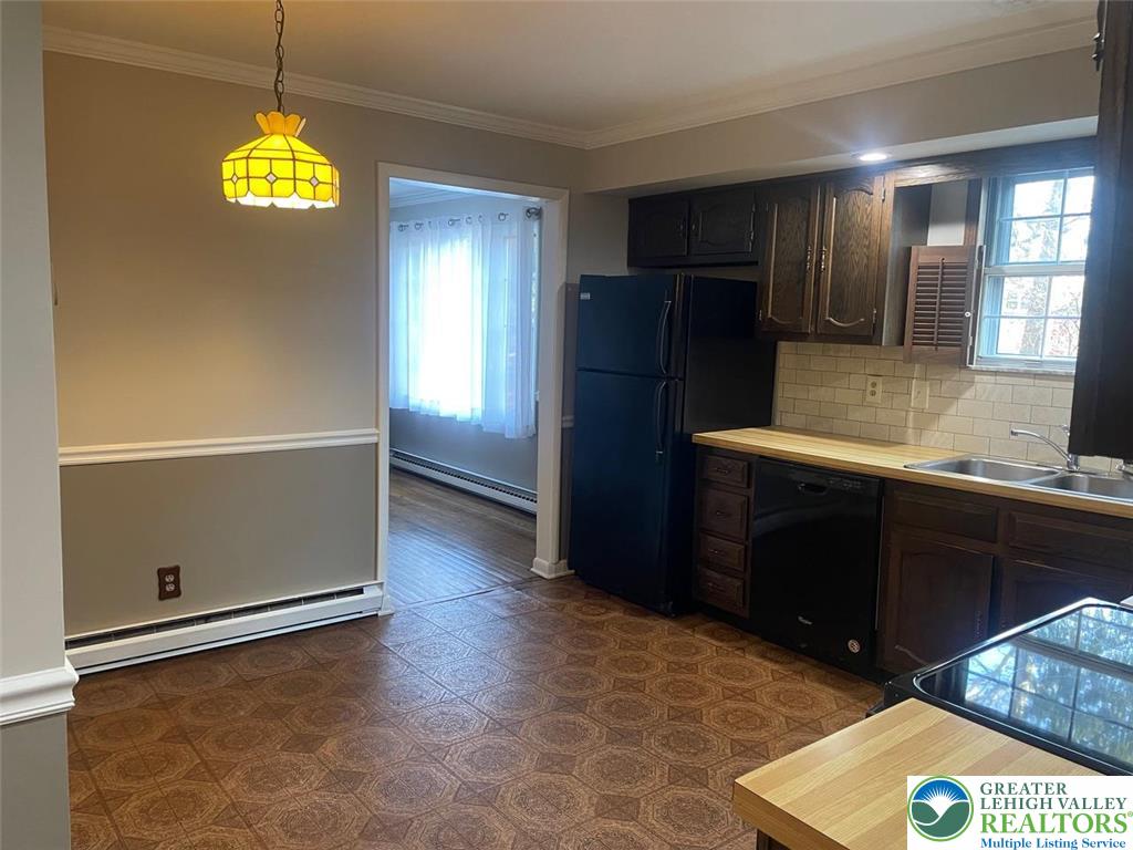 3516 Edinburgh Road Allentown, PA 18104 - Photo 13 of 36 Kitchen painted and new stove and microwave in 2024