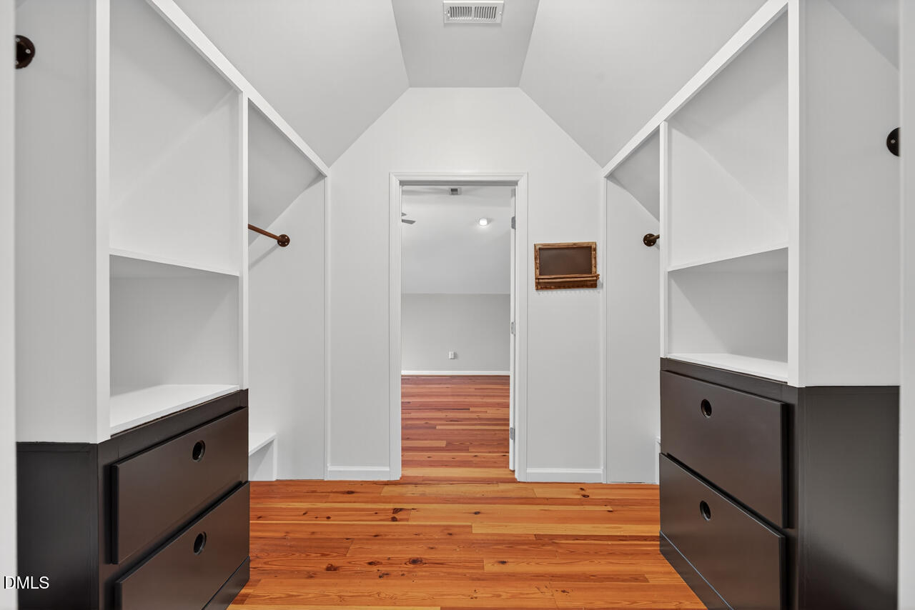 6304 Ansley Lane Raleigh, NC 27612 - Photo 31 of 49 Extensive closet in passthrough to newer addition