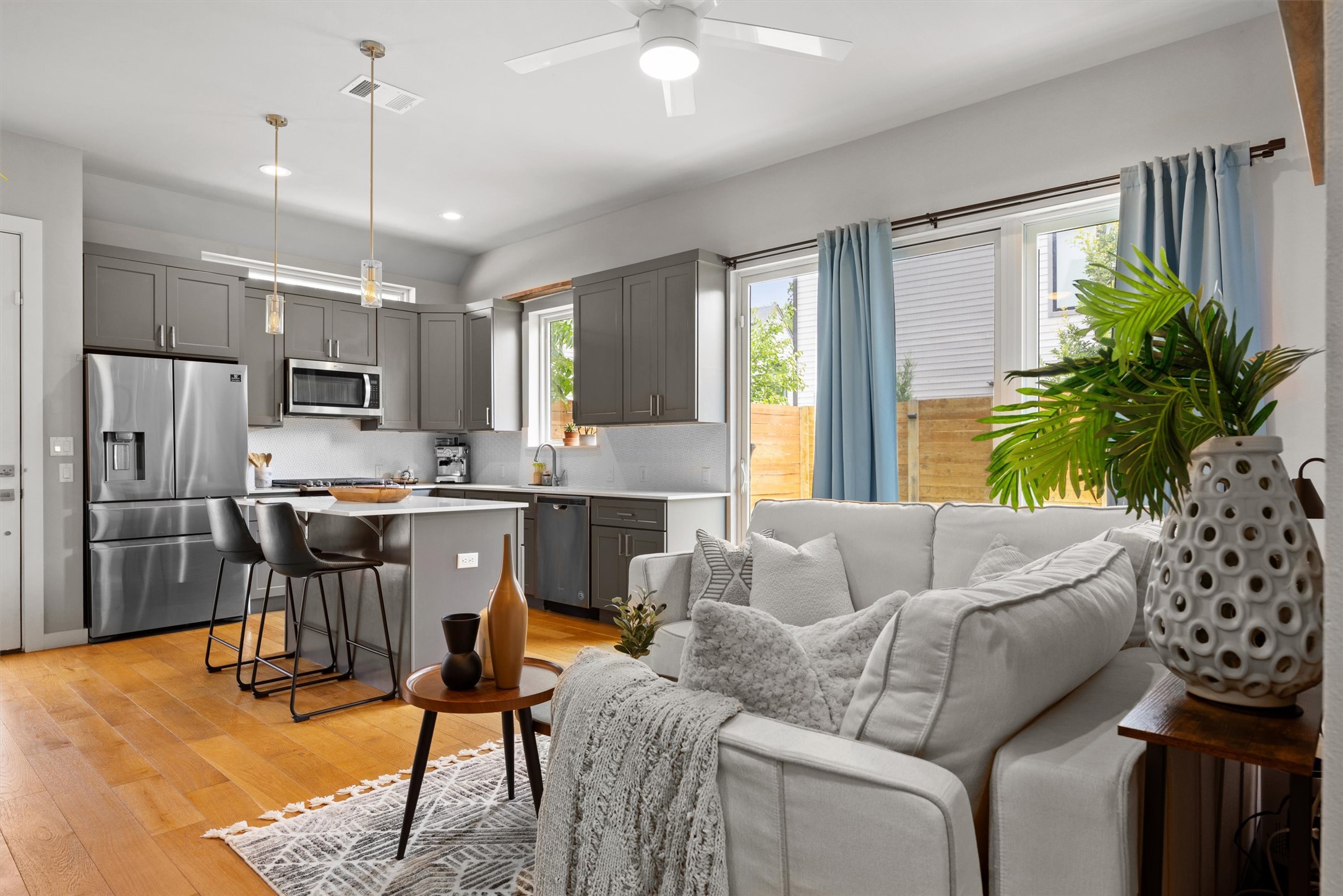 1116 Stobaugh Street, Unit B Austin, TX 78757 - Photo 1 of 38 The open-concept main floor feels bright and airy with high ceilings and natural light throughout.