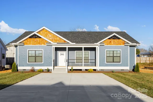 a house view with a garden space
