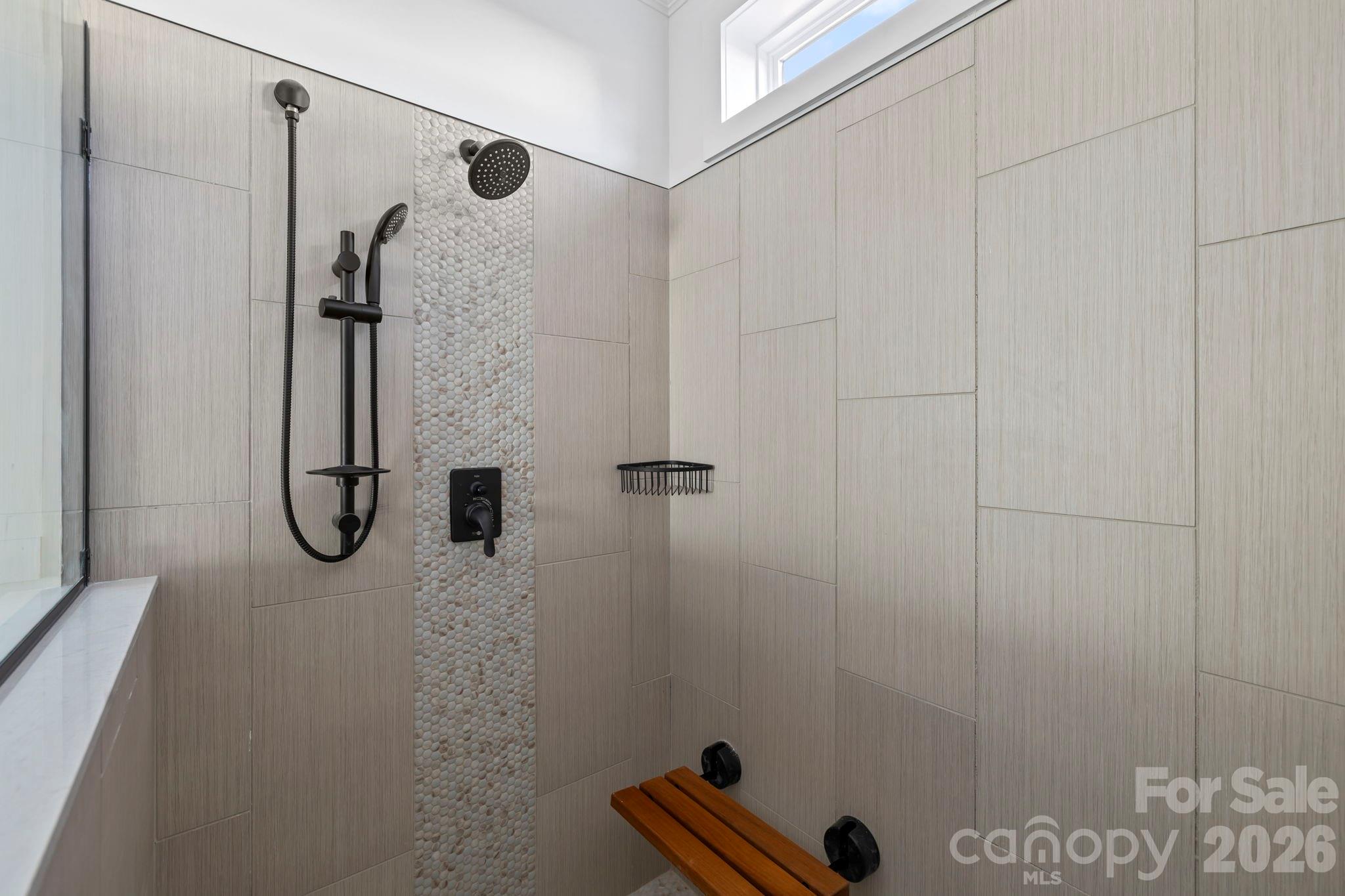 204 Southern Charm Road Arden, NC 28704 - Photo 18 of 24 a bathroom with a shower