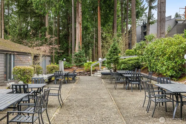 a view of a tables and chairs in the patio