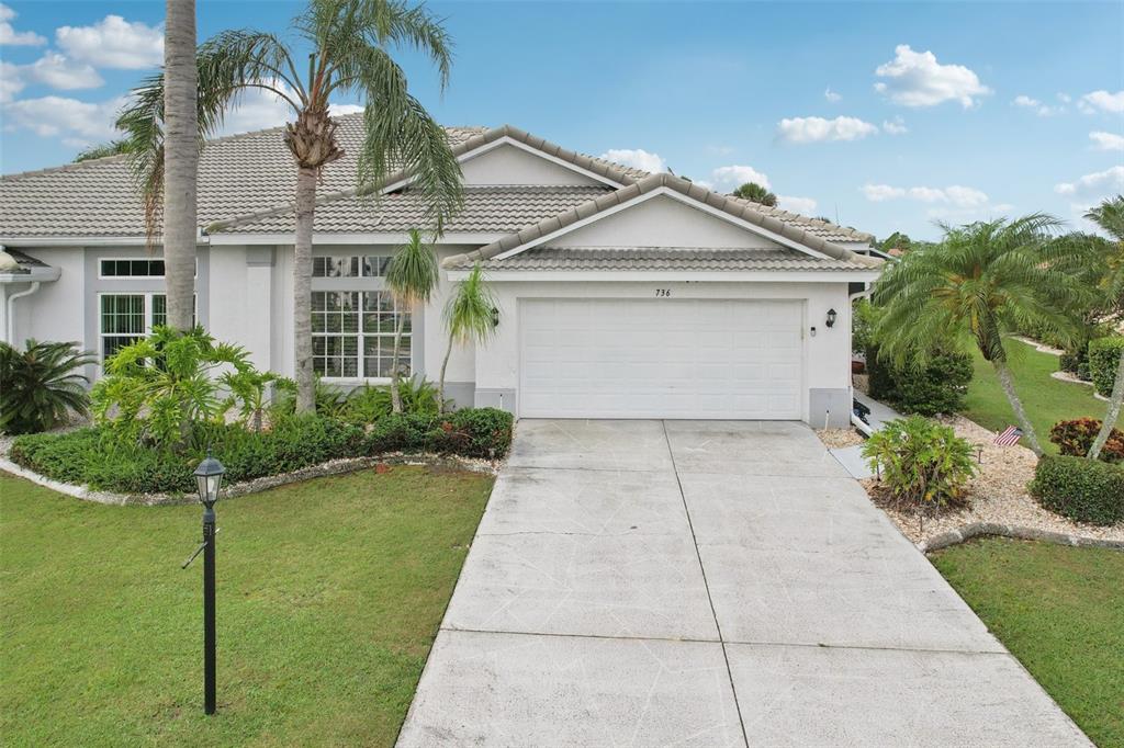 736 Fairway Ridge Court Sun City Center, FL 33573 - Photo 1 of 1 a view of a house with a yard