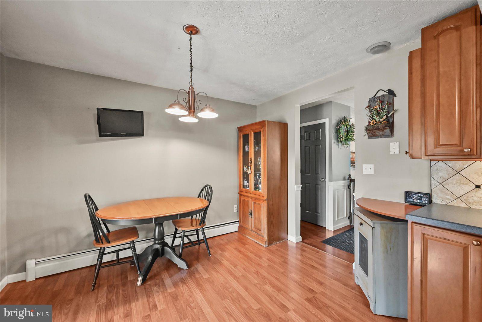 253 Kindig Road Littlestown, PA 17340 - Photo 11 of 41 Cozy kitchen with warm wood accents.