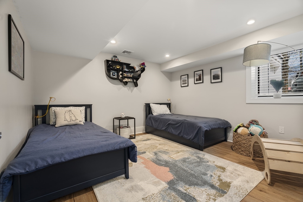 148 Kent Street, Unit 148 Brookline, MA 02446 - Photo 12 of 19 a bedroom with a bed and dresser