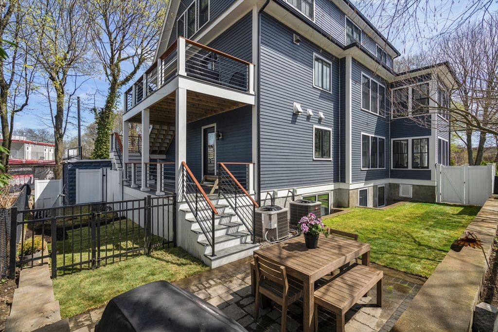 148 Kent Street, Unit 148 Brookline, MA 02446 - Photo 19 of 19 a view of outdoor space yard and patio
