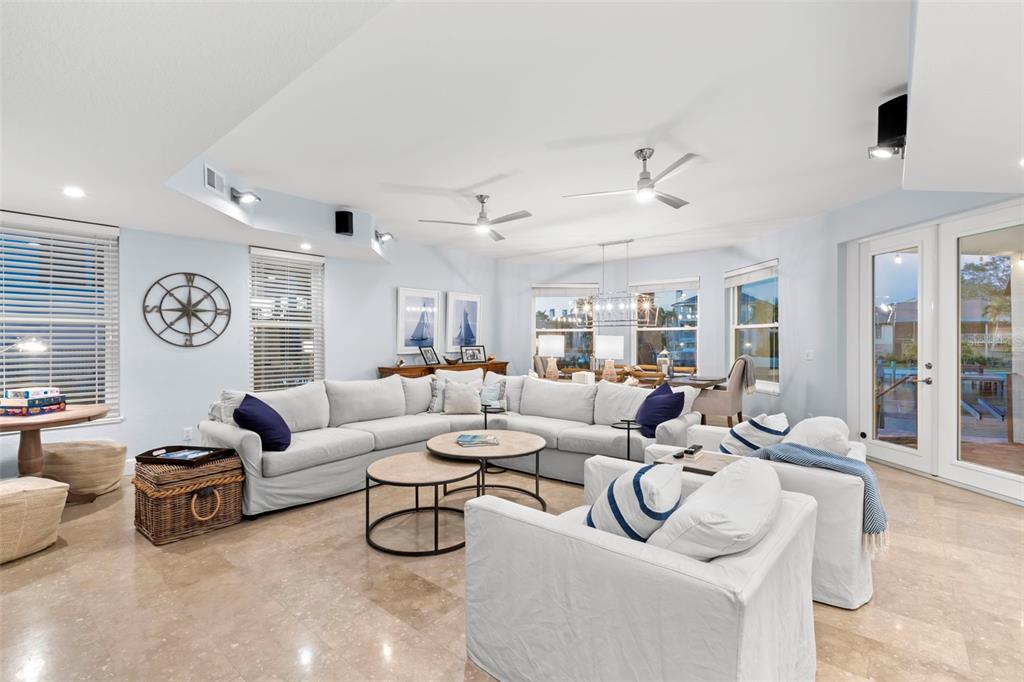 123 8th Street East Tierra Verde, FL 33715 - Photo 13 of 87 a living room with furniture and a large window