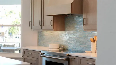 a living room with furniture a fireplace and a dining table with wooden floor