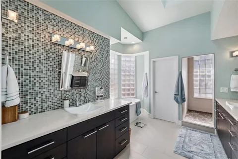 a utility room with cabinets