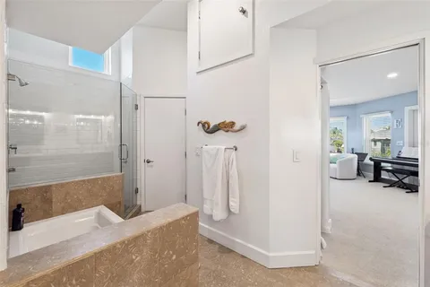 a view of a swimming pool with an outdoor seating