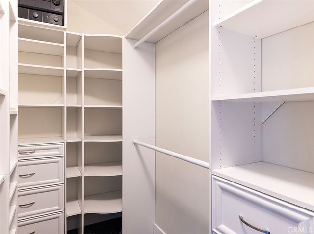 a view of an empty walk in closet