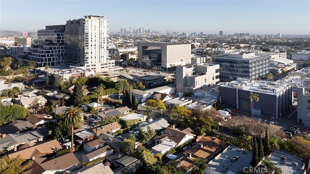 a view of a city with tall buildings