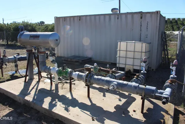 a terrace of a house with outdoor seating