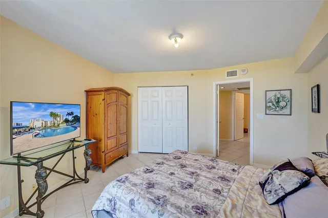 a spacious bathroom with a granite countertop sink and a mirror