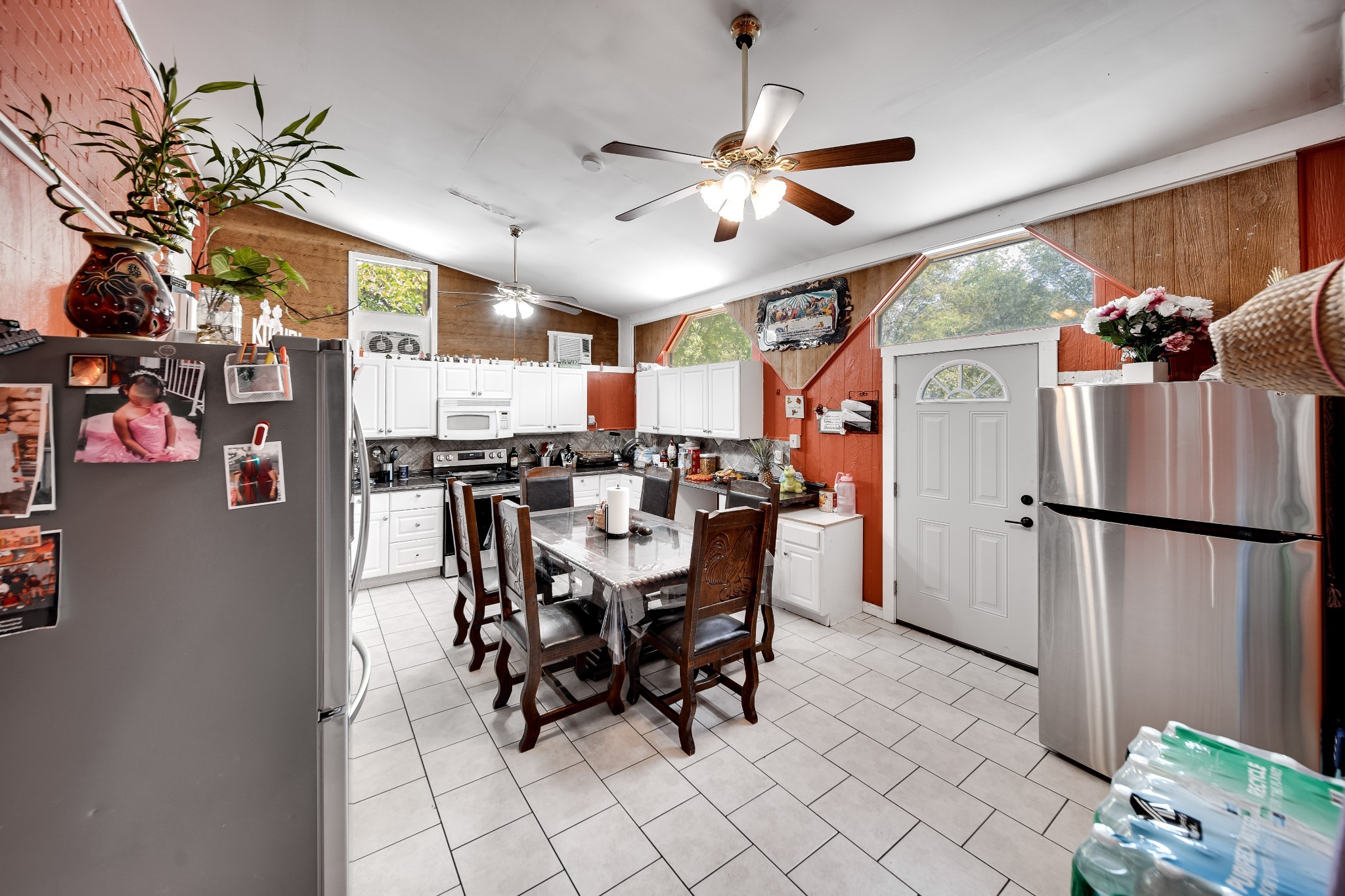 709 Florence Circle Madison, TN 37115 - Photo 22 of 39 a dining room filled with furniture and chandelier
