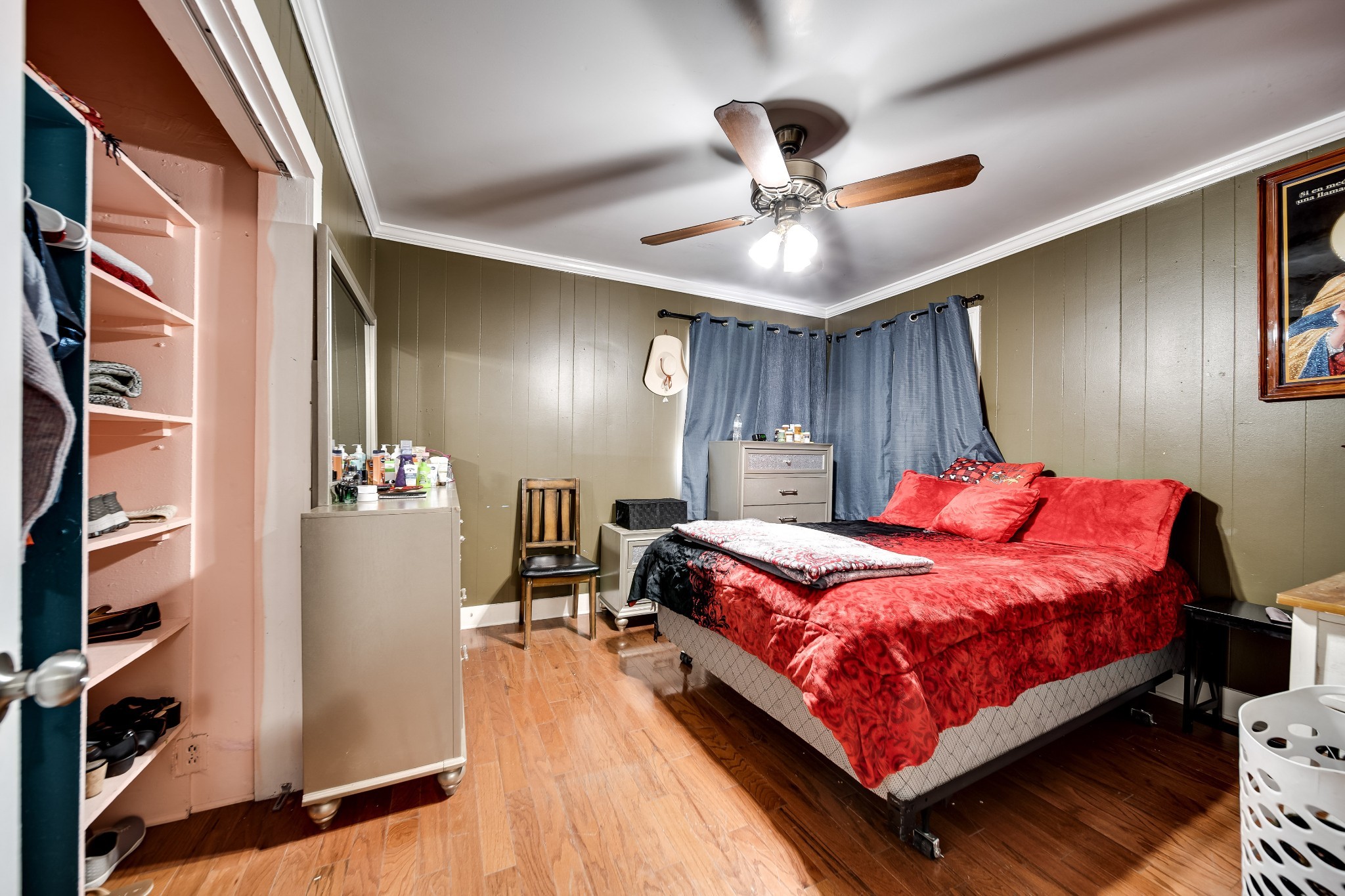 709 Florence Circle Madison, TN 37115 - Photo 9 of 39 a bed room with a bed and a chandelier