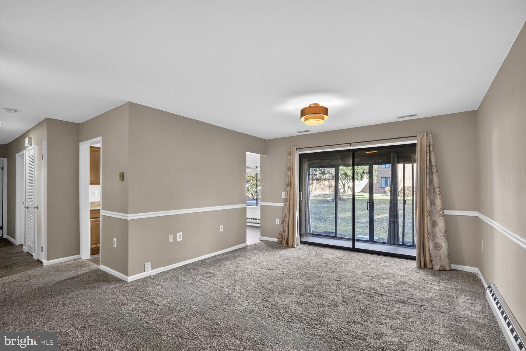 15320 Pine Orchard Drive, Unit 83C1 Silver Spring, MD 20906 - Photo 5 of 21 a view of an empty room with a window