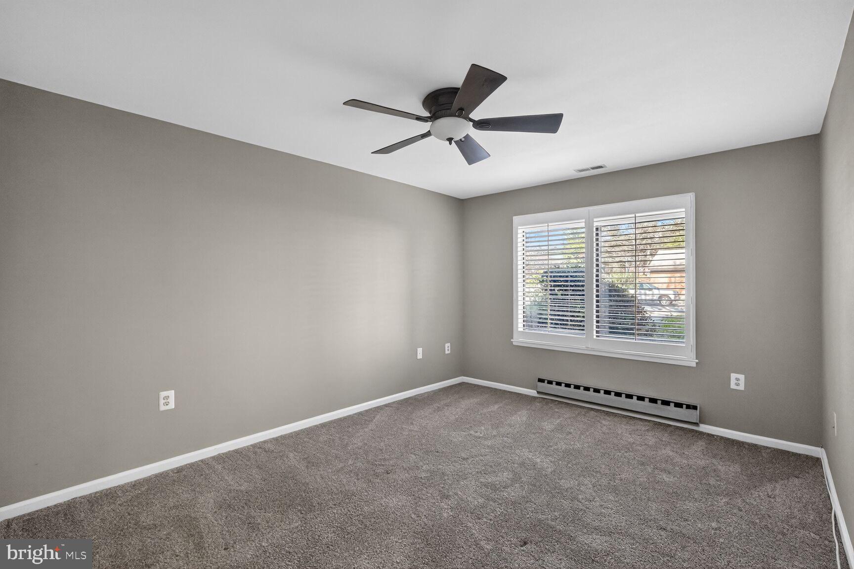 15320 Pine Orchard Drive, Unit 83C1 Silver Spring, MD 20906 - Photo 7 of 21 a view of an empty room with a window