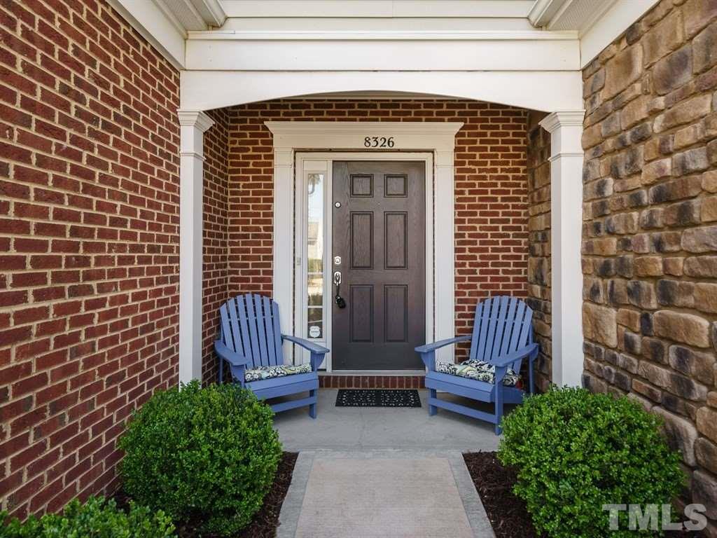 8326 Pilots View Drive Raleigh, NC 27617 - Photo 3 of 25 a view of front door of house with stairs