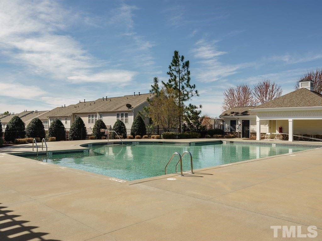8326 Pilots View Drive Raleigh, NC 27617 - Photo 23 of 25 a view of a lake with houses