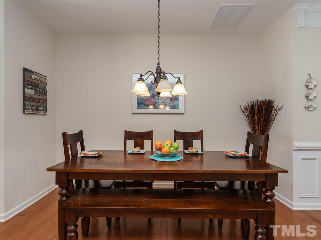 8326 Pilots View Drive Raleigh, NC 27617 - Photo 6 of 25 a view of a dining room with furniture