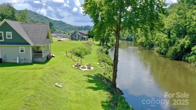 a view of a lake with a building in the background