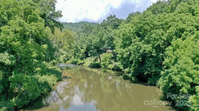 a view of a lake view with a garden