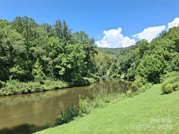 a view of a lake from a yard