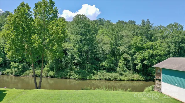 a view of a lake from a yard
