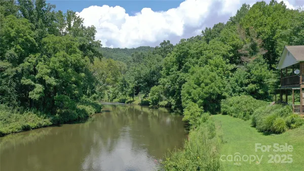 a view of a lake view with a garden