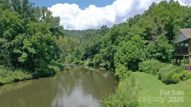 a view of a lake view with a garden
