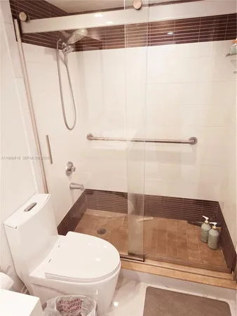a bathroom with a sink and a shower