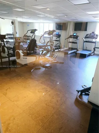 a view of a room with gym equipment