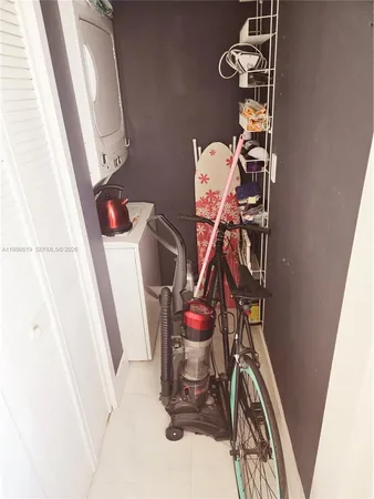 a view of storage and utility room with a sink